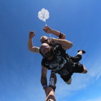 Tandem skydiving pair in freefall