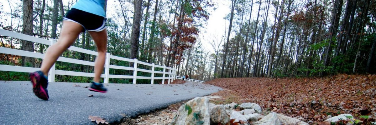 women running the Cape Fear River Trail in Fayetteville