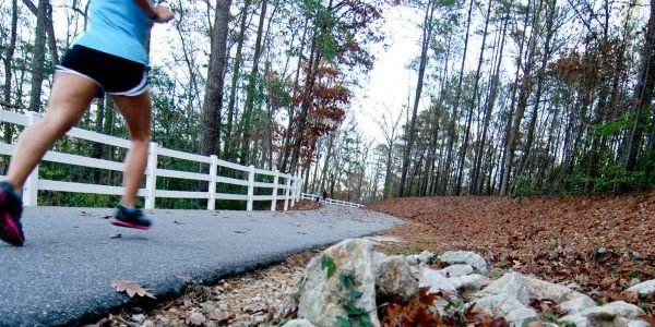 women running the Cape Fear River Trail in Fayetteville