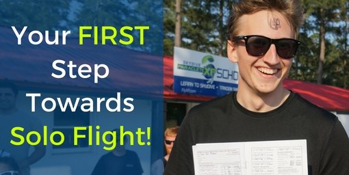 young man holding skydiving license