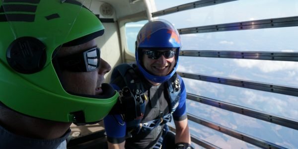experienced jumpers riding to altitude