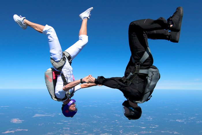 Skydiving videographer Elliot Byrd and wife Lauren wedding dance in the sky.