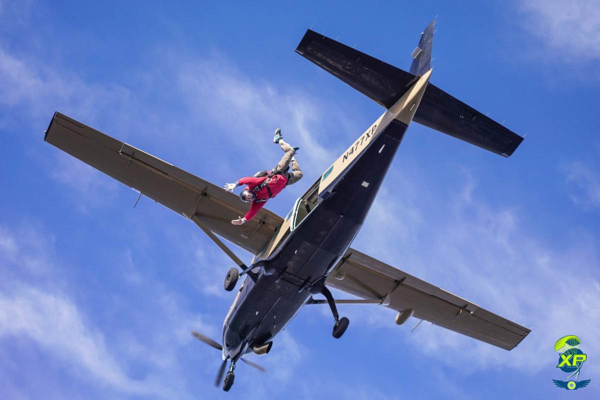 is skydiving a career - man jumping from plane