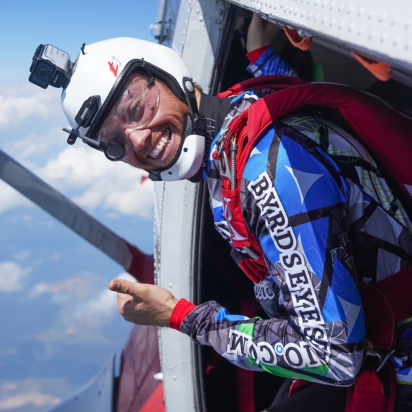 A skydiver prepares to jump.