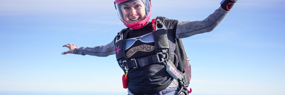 A skydiver falls through the air.