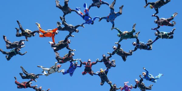 Group of skydivers belly formation skydiving in freefall