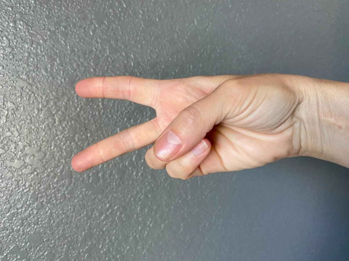 legs out skydiving hand signal